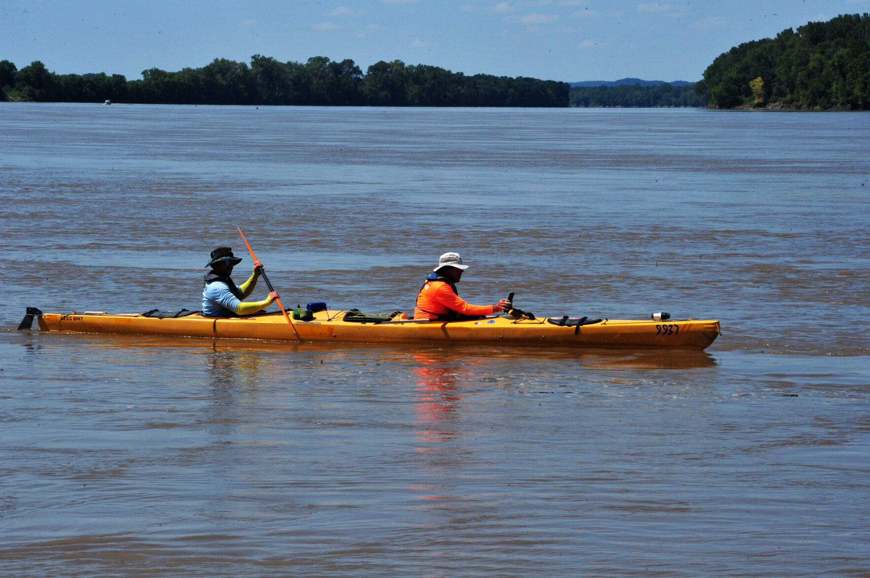 Drew Legg and Leon Legg paddle